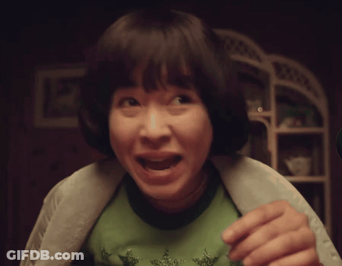 Young Girl In Green Star Shirt GIF