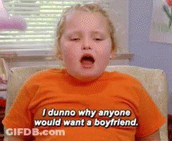 Young Girl In Orange Shirt Says I Dunno Why Anyone Would Want A Boyfriend GIF