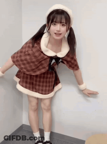 Young Girl Making Funny Face And Pointing Finger GIF