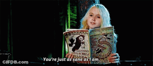 Young Girl Reading Book And Talking GIF