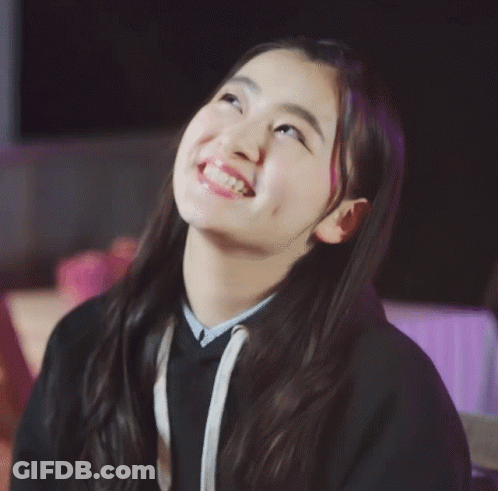 Young Girl Smiling And Clapping Hands GIF