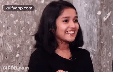 Young Girl Smiling At Camera GIF