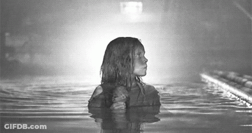 Young Girl Standing In Water GIF