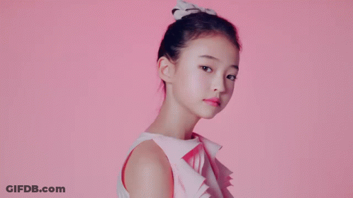 Young Girl With Long Hair Making Funny Face GIF