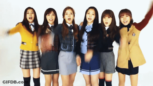 Young Girls In School Uniforms Standing Together GIF