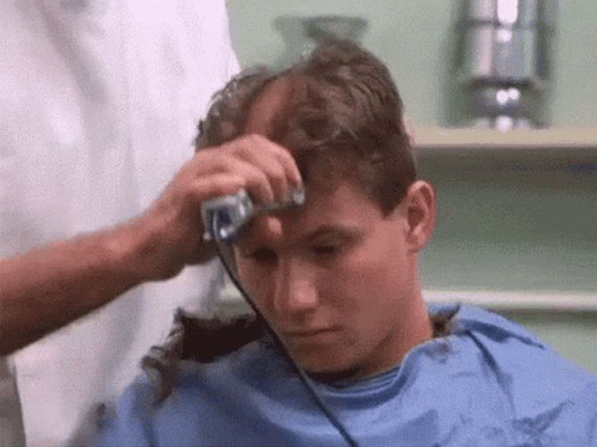 Young Guy Sad During Shaving Of Head GIF