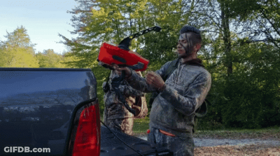 Young Guys Preparing Hunting Gears GIF