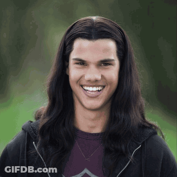 Young Long Dark-Haired Man Smiling In Black Hoodie GIF