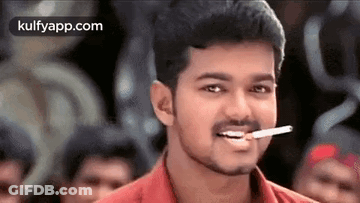 Young Man Brushing Teeth GIF
