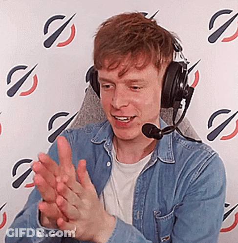 Young Man Clapping With Headphones And Microphone GIF