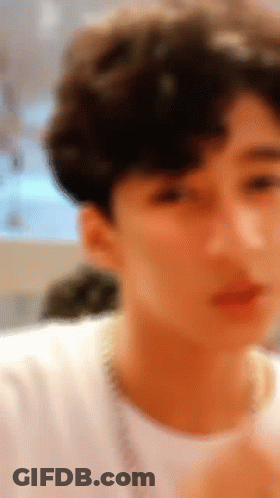 Young Man Close Up In White Shirt GIF