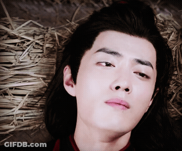 Young Man Close Up With Straw Background GIF