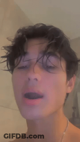 Young Man Closing Eyes And Opening Mouth GIF