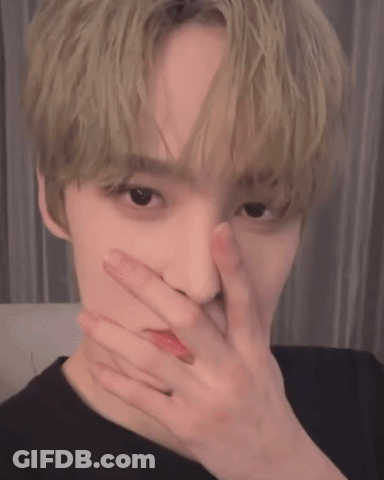 Young Man Covering Face GIF