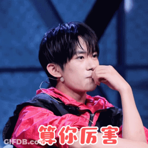 Young Man Covering Mouth In Pink Jacket GIF