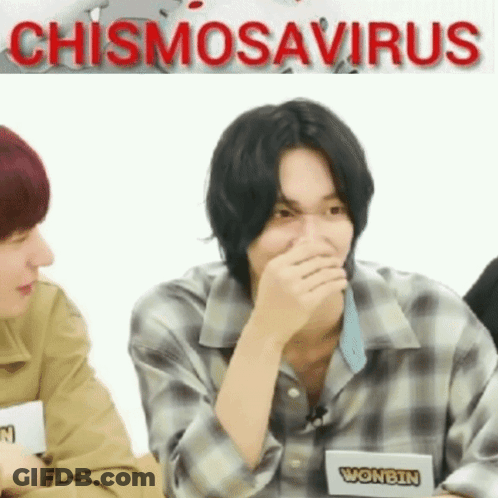 Young Man Covering Mouth Sitting Next To Another Young Man GIF