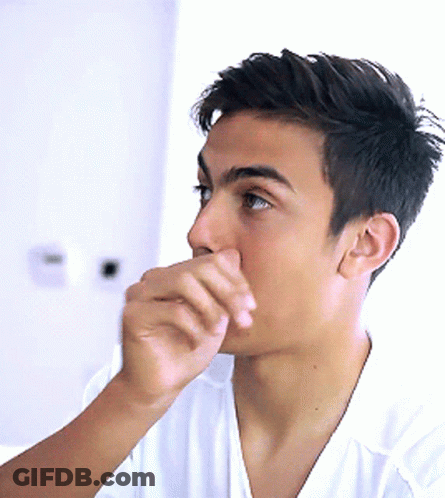 Young Man Covering Mouth With Hand GIF