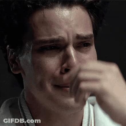 Young Man Crying Covering Face GIF