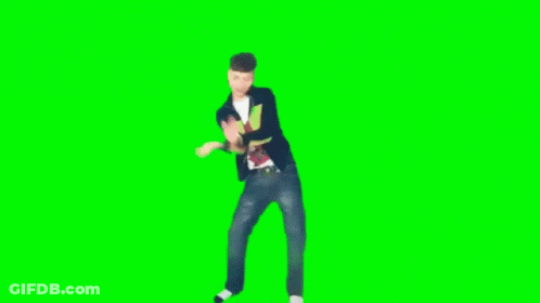 Young Man Dancing In Front Of Green Screen GIF