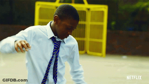 Young Man Dancing In Front Of Netflix Fence GIF
