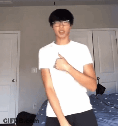 Young Man Dancing In White Shirt GIF