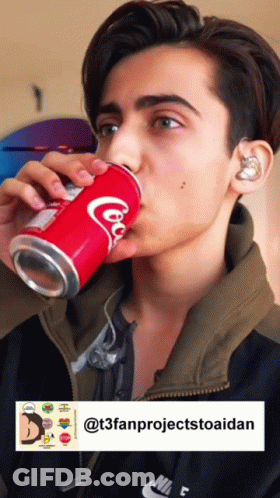Young Man Drinking Coca Cola GIF