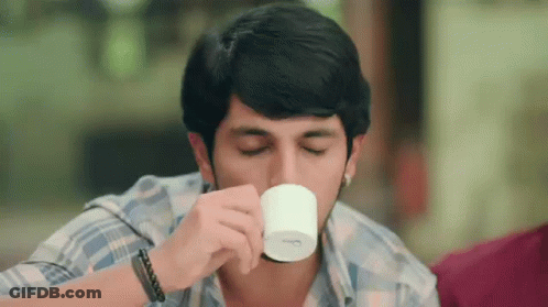 Young Man Drinking Coffee GIF
