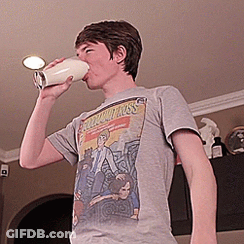 Young Man Drinking Milk In Samurai Kiss T-Shirt GIF