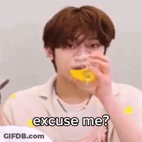 Young Man Drinking Orange Juice Making Funny Face GIF
