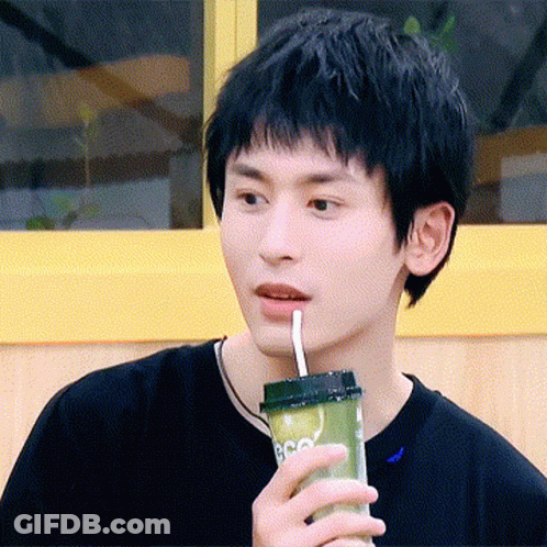 Young Man Drinking Through Straw GIF