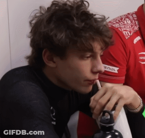 Young Man Drinking Water With Enol Shirt GIF