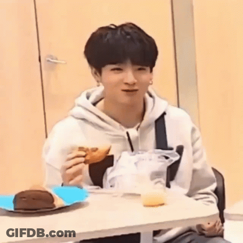 Young Man Eating Sandwich GIF
