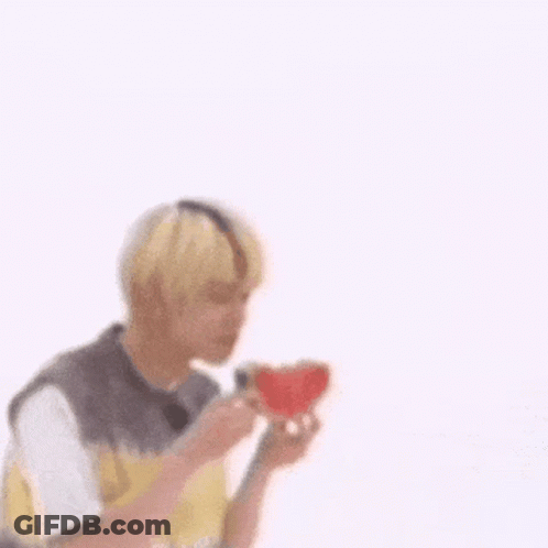 Young Man Eating Watermelon With Question Mark GIF
