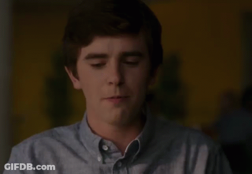 Young Man Eating With Fork And Knife GIF