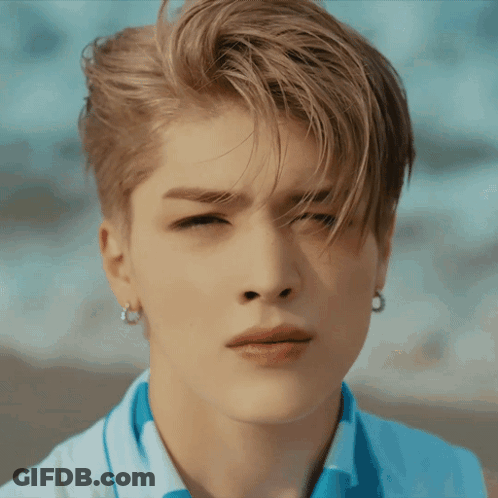 Young Man Eyes Closed Hair Blowing In Wind GIF