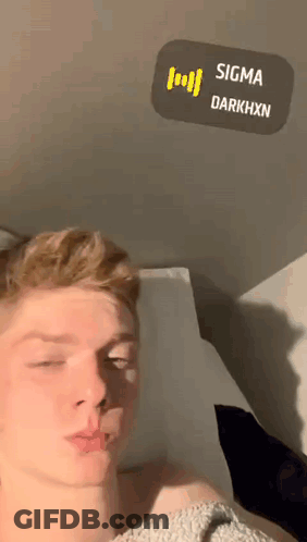 Young Man Eyes Closed With Sigma Darkhxn Sticker Above GIF
