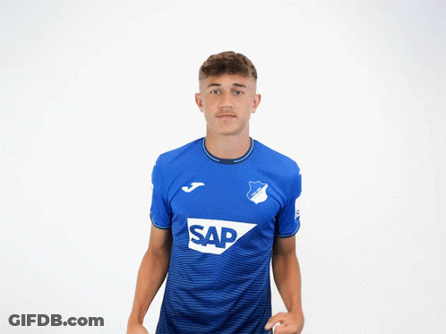 Young Man Flexing Muscles In Blue Shirt Saying Sap GIF