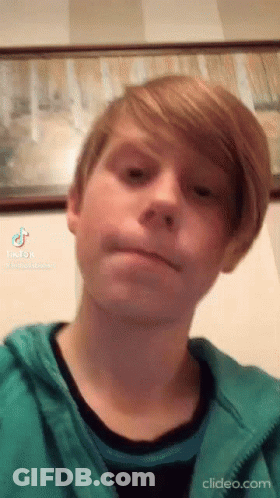 Young Man Green Jacket Black Shirt Funny Face GIF