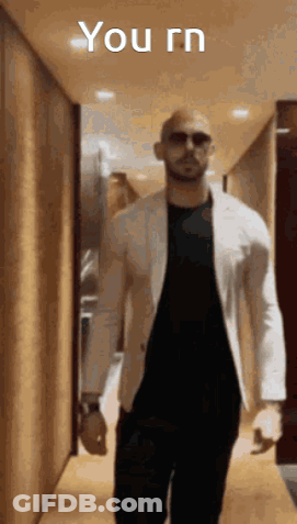 Young Man Holding Ariel Detergent GIF