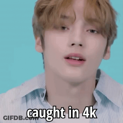 Young Man Holding Camera Saying Caught In 4K GIF