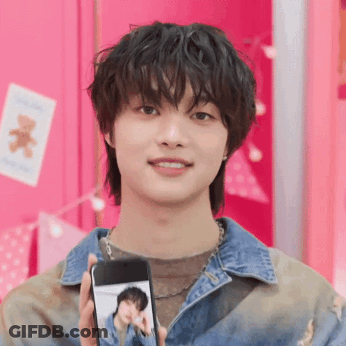 Young Man Holding Cell Phone GIF