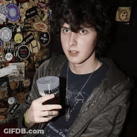 Young Man Holding Cup That Says Brasse GIF