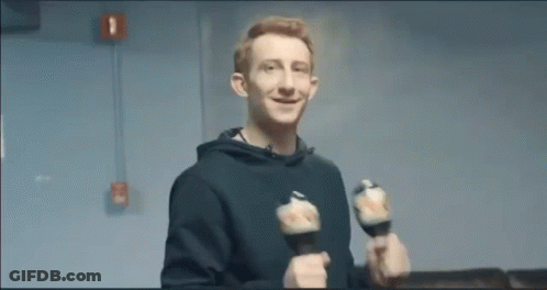 Young Man Holding Dumbbells Smiling GIF