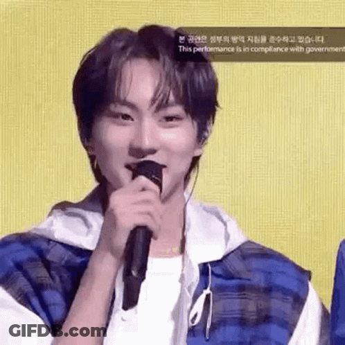 Young Man Holding Microphone GIF
