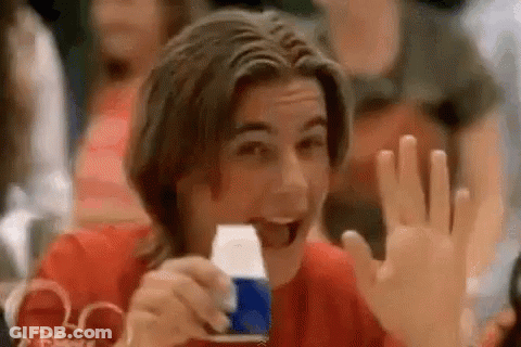 Young Man Holding Pepsi Can And Waving GIF