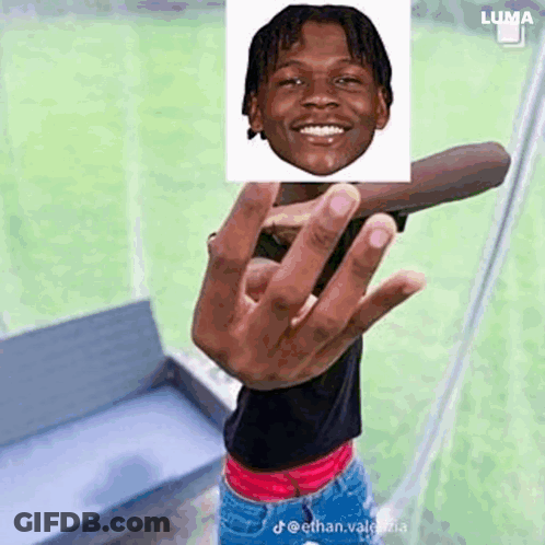 Young Man Holding Picture Of Young Man's Face GIF