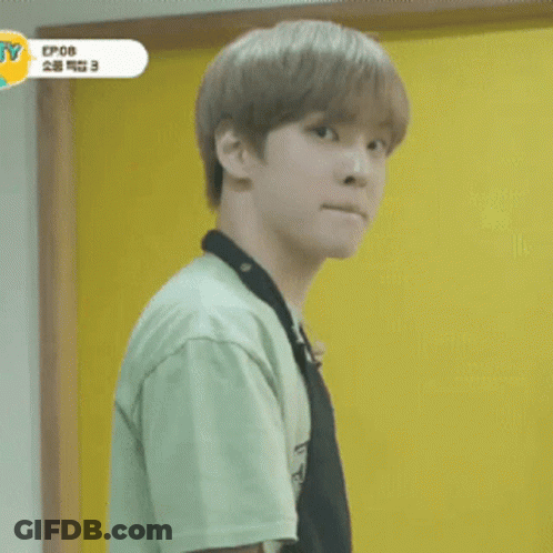 Young Man In Apron Smiling GIF