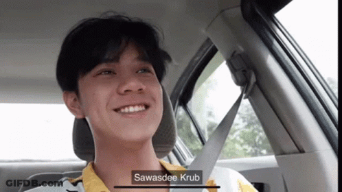 Young Man In Back Seat With Seat Belt Around Neck GIF