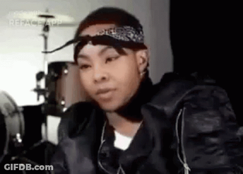 Young Man In Bandana And Black Jacket At Drum Set GIF