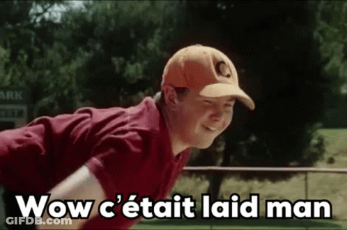 Young Man In Baseball Cap And Red Shirt Standing In Field GIF